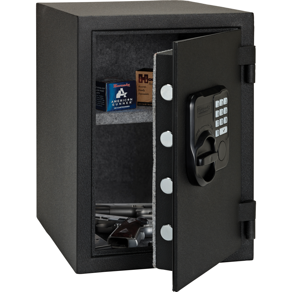 Hornady 95407 Fireproof Keypad Safe front view A black digital keypad gun safe with its door open, showing shelves inside with ammunition boxes and handguns. The safe features a textured black finish, silver handle accents, and a gray felt-lined interior.